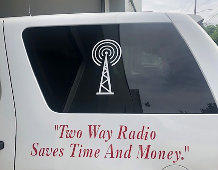 Industrial Electronics, Inc. logo window decal with the caption "Two Way Radio Saves Time And Money"